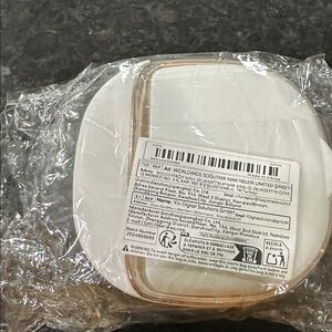 White and Gold Container